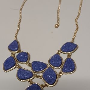 Gorgeous and rare Lapis Lazuli wrapped in gold bib necklace.